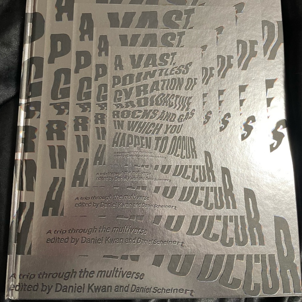 A Vast, Pointless Gyration of Radioactive Rocks and Gas in Which You…A24 Book